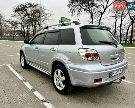 Серый Мицубиси Аутлендер, объемом двигателя 2 л и пробегом 209 тыс. км за 7200 $, фото 4 на Automoto.ua
