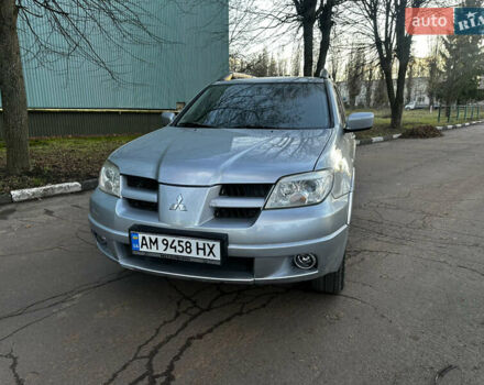 Серый Мицубиси Аутлендер, объемом двигателя 2.4 л и пробегом 320 тыс. км за 6000 $, фото 4 на Automoto.ua