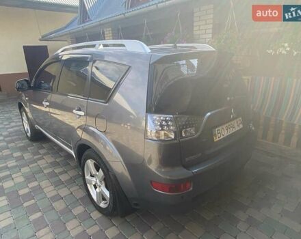 Серый Мицубиси Аутлендер, объемом двигателя 3 л и пробегом 232 тыс. км за 9200 $, фото 2 на Automoto.ua