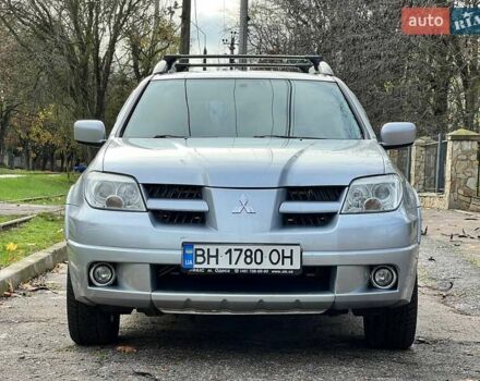 Серый Мицубиси Аутлендер, объемом двигателя 2.38 л и пробегом 170 тыс. км за 6900 $, фото 2 на Automoto.ua