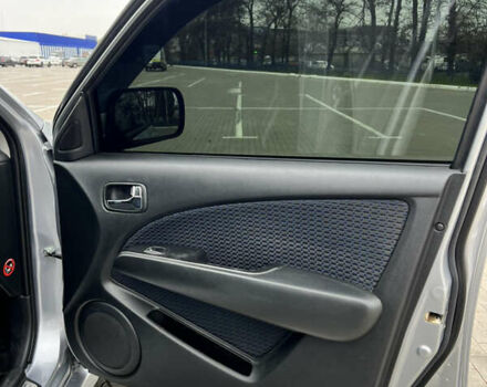 Серый Мицубиси Аутлендер, объемом двигателя 2 л и пробегом 209 тыс. км за 7200 $, фото 10 на Automoto.ua