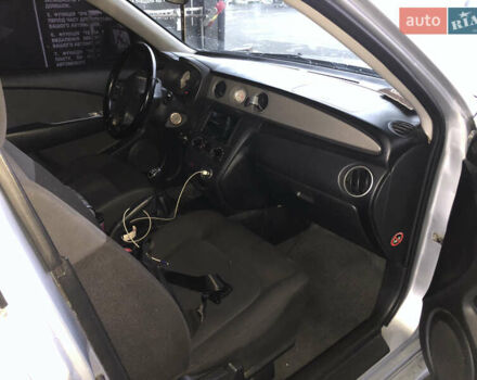 Серый Мицубиси Аутлендер, объемом двигателя 2 л и пробегом 170 тыс. км за 6950 $, фото 6 на Automoto.ua