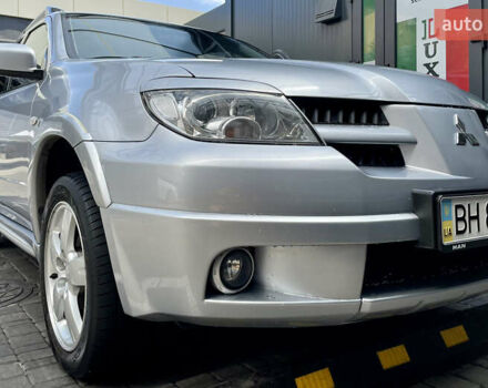 Сірий Міцубісі Аутлендер, об'ємом двигуна 2 л та пробігом 130 тис. км за 8500 $, фото 1 на Automoto.ua