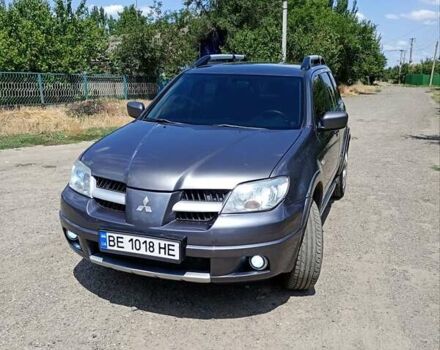 Серый Мицубиси Аутлендер, объемом двигателя 2.35 л и пробегом 342 тыс. км за 6900 $, фото 1 на Automoto.ua