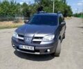 Серый Мицубиси Аутлендер, объемом двигателя 2.35 л и пробегом 342 тыс. км за 6900 $, фото 1 на Automoto.ua