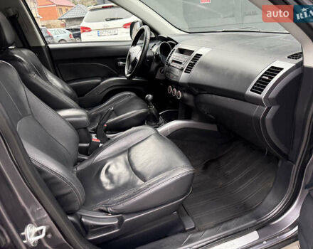 Сірий Міцубісі Аутлендер, об'ємом двигуна 2 л та пробігом 237 тис. км за 8999 $, фото 49 на Automoto.ua