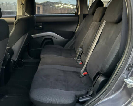 Серый Мицубиси Аутлендер, объемом двигателя 2.4 л и пробегом 210 тыс. км за 8300 $, фото 30 на Automoto.ua