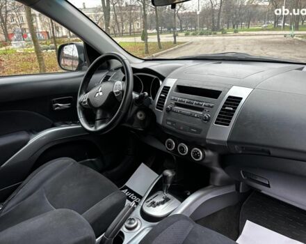 Серый Мицубиси Аутлендер, объемом двигателя 2.4 л и пробегом 237 тыс. км за 8490 $, фото 17 на Automoto.ua