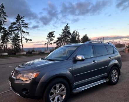 Серый Мицубиси Аутлендер, объемом двигателя 2.4 л и пробегом 321 тыс. км за 10000 $, фото 1 на Automoto.ua