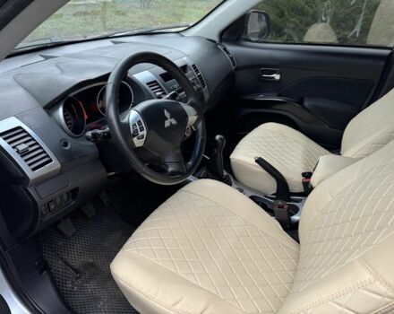 Серый Мицубиси Аутлендер, объемом двигателя 2.4 л и пробегом 241 тыс. км за 7350 $, фото 6 на Automoto.ua