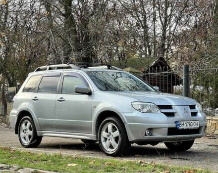 Серый Мицубиси Аутлендер, объемом двигателя 2.4 л и пробегом 170 тыс. км за 6900 $, фото 4 на Automoto.ua