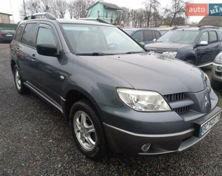Серый Мицубиси Аутлендер, объемом двигателя 2 л и пробегом 232 тыс. км за 5950 $, фото 1 на Automoto.ua