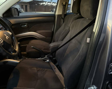 Серый Мицубиси Аутлендер, объемом двигателя 2.4 л и пробегом 210 тыс. км за 8300 $, фото 33 на Automoto.ua