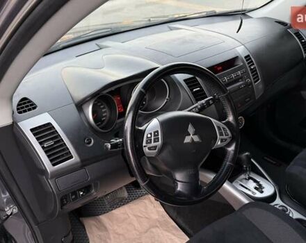 Серый Мицубиси Аутлендер, объемом двигателя 2.4 л и пробегом 174 тыс. км за 9599 $, фото 15 на Automoto.ua