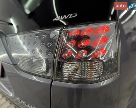 Сірий Міцубісі Аутлендер, об'ємом двигуна 2 л та пробігом 235 тис. км за 8950 $, фото 20 на Automoto.ua