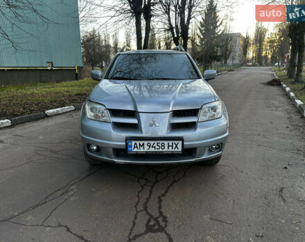 Серый Мицубиси Аутлендер, объемом двигателя 2.4 л и пробегом 320 тыс. км за 6000 $, фото 3 на Automoto.ua