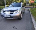 Серый Мицубиси Аутлендер, объемом двигателя 2 л и пробегом 250 тыс. км за 6700 $, фото 2 на Automoto.ua