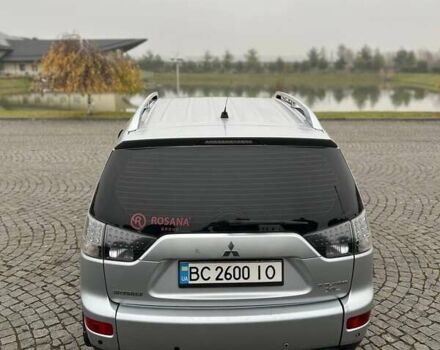 Серый Мицубиси Аутлендер, объемом двигателя 2.36 л и пробегом 285 тыс. км за 8500 $, фото 3 на Automoto.ua