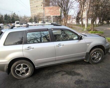 Сірий Міцубісі Аутлендер, об'ємом двигуна 2 л та пробігом 161 тис. км за 7500 $, фото 2 на Automoto.ua