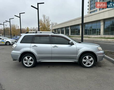 Серый Мицубиси Аутлендер, объемом двигателя 2.38 л и пробегом 81 тыс. км за 8700 $, фото 6 на Automoto.ua