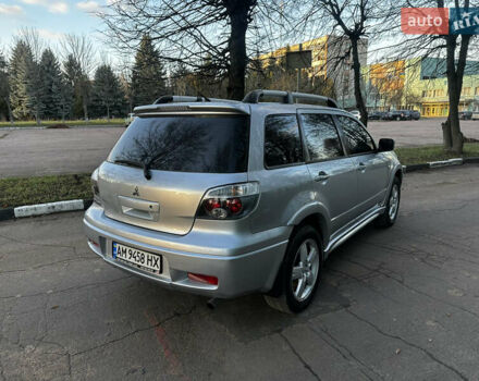 Серый Мицубиси Аутлендер, объемом двигателя 2.4 л и пробегом 320 тыс. км за 6000 $, фото 12 на Automoto.ua
