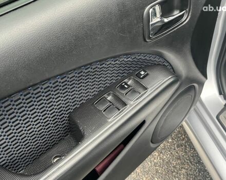 Серый Мицубиси Аутлендер, объемом двигателя 2.4 л и пробегом 324 тыс. км за 6890 $, фото 27 на Automoto.ua