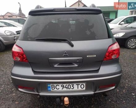 Серый Мицубиси Аутлендер, объемом двигателя 2 л и пробегом 232 тыс. км за 5950 $, фото 5 на Automoto.ua