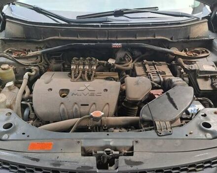 Сірий Міцубісі Аутлендер, об'ємом двигуна 2.4 л та пробігом 169 тис. км за 7000 $, фото 4 на Automoto.ua