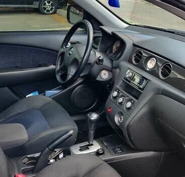 Серый Мицубиси Аутлендер, объемом двигателя 2.38 л и пробегом 323 тыс. км за 6800 $, фото 13 на Automoto.ua