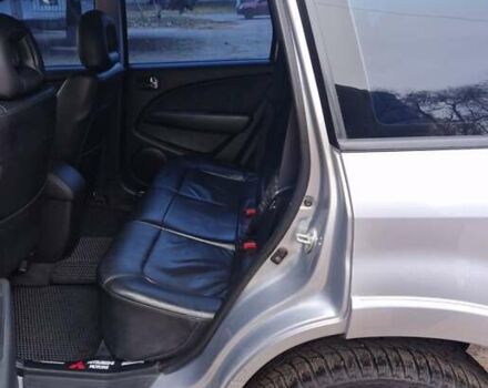 Серый Мицубиси Аутлендер, объемом двигателя 2.38 л и пробегом 113 тыс. км за 8900 $, фото 2 на Automoto.ua