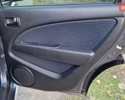 Серый Мицубиси Аутлендер, объемом двигателя 2 л и пробегом 157 тыс. км за 8300 $, фото 26 на Automoto.ua