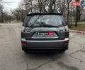 Серый Мицубиси Аутлендер, объемом двигателя 2.4 л и пробегом 237 тыс. км за 8490 $, фото 5 на Automoto.ua