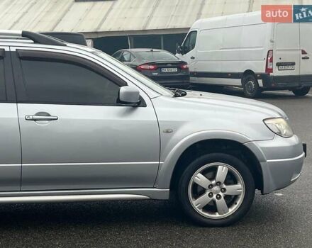 Серый Мицубиси Аутлендер, объемом двигателя 2.4 л и пробегом 324 тыс. км за 6890 $, фото 13 на Automoto.ua