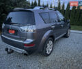 Серый Мицубиси Аутлендер, объемом двигателя 2 л и пробегом 235 тыс. км за 9000 $, фото 4 на Automoto.ua