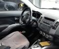 Серый Мицубиси Аутлендер, объемом двигателя 2.4 л и пробегом 158 тыс. км за 8000 $, фото 4 на Automoto.ua
