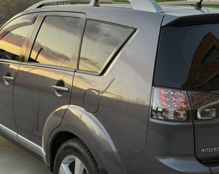 Серый Мицубиси Аутлендер, объемом двигателя 2.4 л и пробегом 210 тыс. км за 8300 $, фото 11 на Automoto.ua