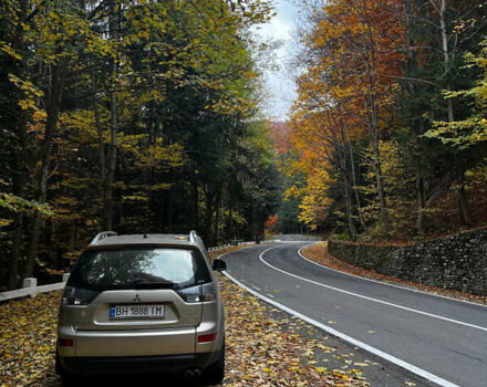 Серый Мицубиси Аутлендер, объемом двигателя 3 л и пробегом 119 тыс. км за 13300 $, фото 1 на Automoto.ua
