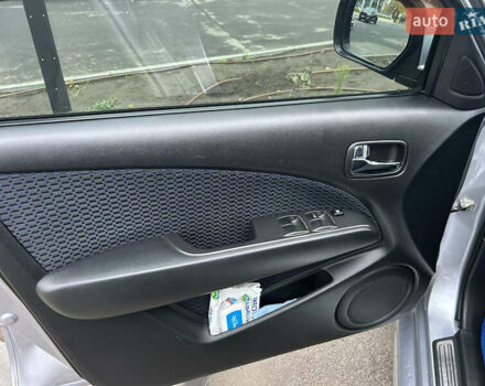 Серый Мицубиси Аутлендер, объемом двигателя 2.38 л и пробегом 81 тыс. км за 8700 $, фото 11 на Automoto.ua