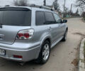 Серый Мицубиси Аутлендер, объемом двигателя 2 л и пробегом 247 тыс. км за 5999 $, фото 3 на Automoto.ua