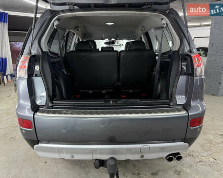 Сірий Міцубісі Аутлендер, об'ємом двигуна 2 л та пробігом 235 тис. км за 8950 $, фото 44 на Automoto.ua