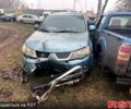 Серый Мицубиси Аутлендер, объемом двигателя 2.4 л и пробегом 205 тыс. км за 3500 $, фото 3 на Automoto.ua