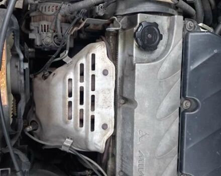 Серый Мицубиси Аутлендер, объемом двигателя 2.38 л и пробегом 143 тыс. км за 7300 $, фото 21 на Automoto.ua