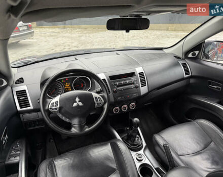 Сірий Міцубісі Аутлендер, об'ємом двигуна 2 л та пробігом 237 тис. км за 8999 $, фото 39 на Automoto.ua