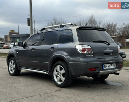 Серый Мицубиси Аутлендер, объемом двигателя 2.38 л и пробегом 254 тыс. км за 7300 $, фото 9 на Automoto.ua