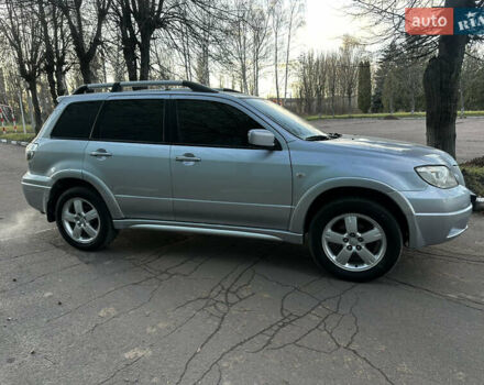 Серый Мицубиси Аутлендер, объемом двигателя 2.4 л и пробегом 320 тыс. км за 6000 $, фото 15 на Automoto.ua