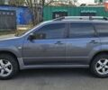 Серый Мицубиси Аутлендер, объемом двигателя 2 л и пробегом 209 тыс. км за 6400 $, фото 1 на Automoto.ua