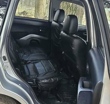 Серый Мицубиси Аутлендер, объемом двигателя 2.2 л и пробегом 280 тыс. км за 5300 $, фото 7 на Automoto.ua