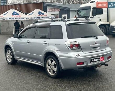 Серый Мицубиси Аутлендер, объемом двигателя 2.4 л и пробегом 324 тыс. км за 6890 $, фото 7 на Automoto.ua