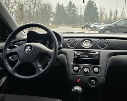Сірий Міцубісі Аутлендер, об'ємом двигуна 2.38 л та пробігом 230 тис. км за 5700 $, фото 17 на Automoto.ua
