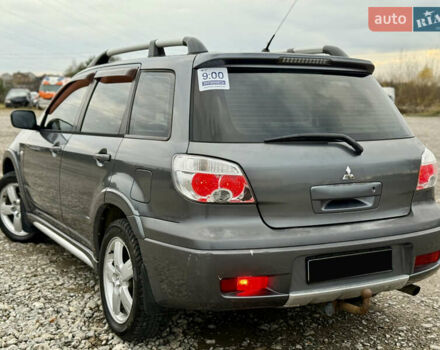 Серый Мицубиси Аутлендер, объемом двигателя 2 л и пробегом 199 тыс. км за 5999 $, фото 5 на Automoto.ua